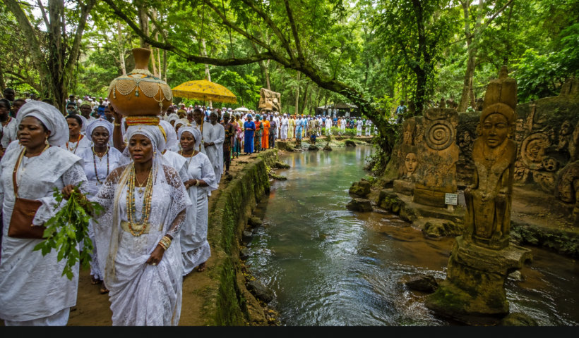 Devotees in procession during the Osun-Osogbo Festival at the Sacred Grove in Osogbo, Osun State, Nigeria.