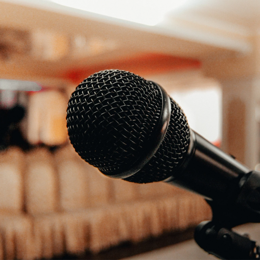 "Close-up of a microphone on a podium, representing public speaking and the viral graduation speech of Vivek Ramaswamy."