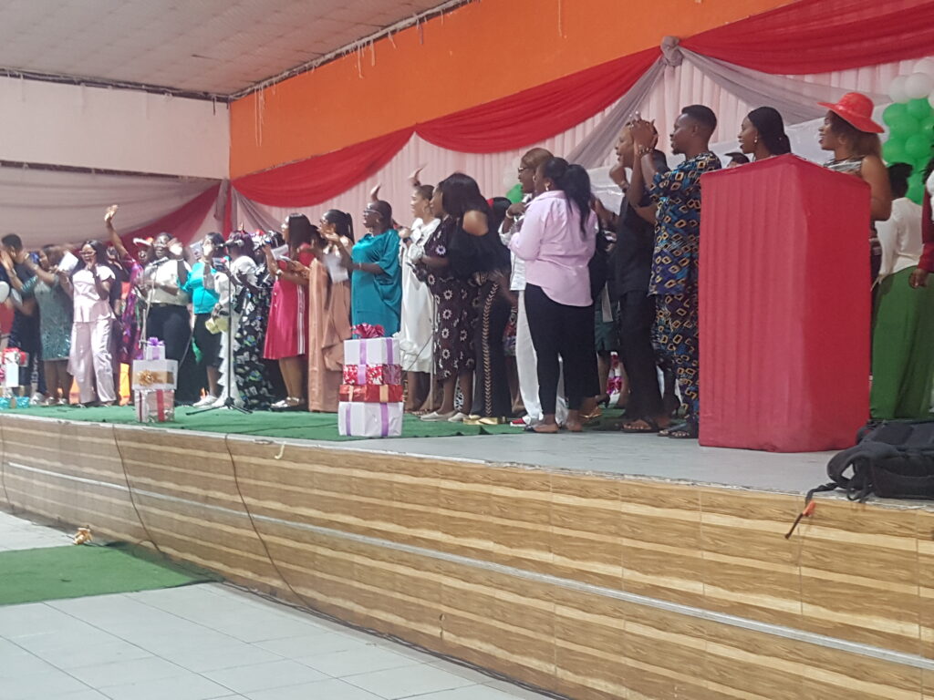 "The Gift of Christmas celebration at Pampers Private School with students, staff, and parents participating in hymns, drama, and musical performances."