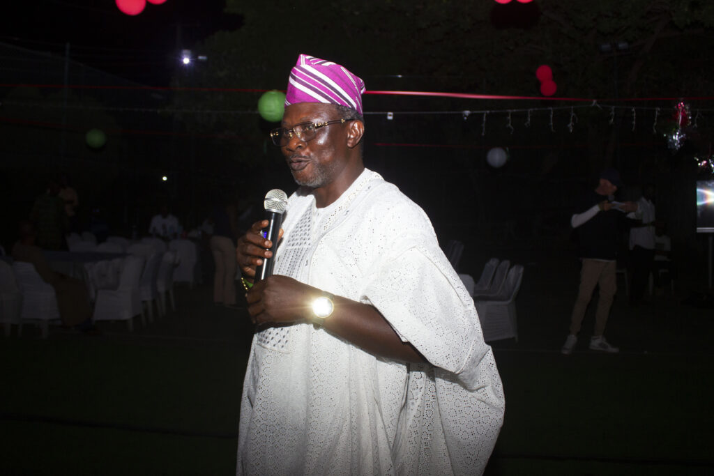 MOMRA residents enjoy a lively Christmas party featuring fun activities, awards, karaoke, and festive cheer in a vibrant atmosphere.