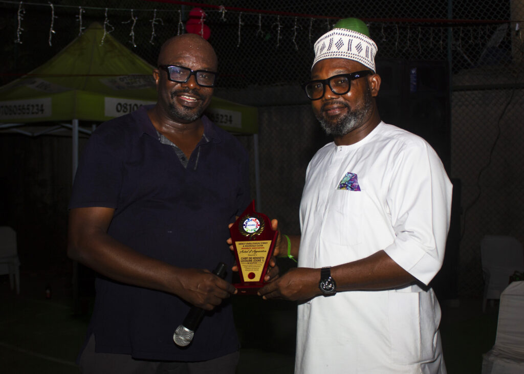 Residents of MOMRA enjoying Christmas festivities with activities, awards, karaoke, and cheerful gatherings in a lively atmosphere.
