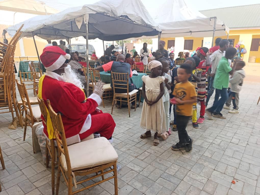  "Father Christmas handing out gifts at the Ajowa Funfair."
