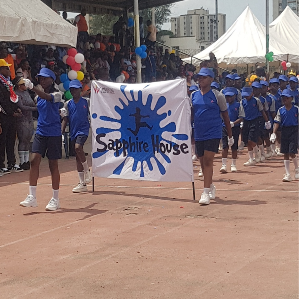 Students and parents at the Pampers Private School 27th Inter-house Sports Competition showcasing vibrant sportsmanship and unity.
Sapphire House 
