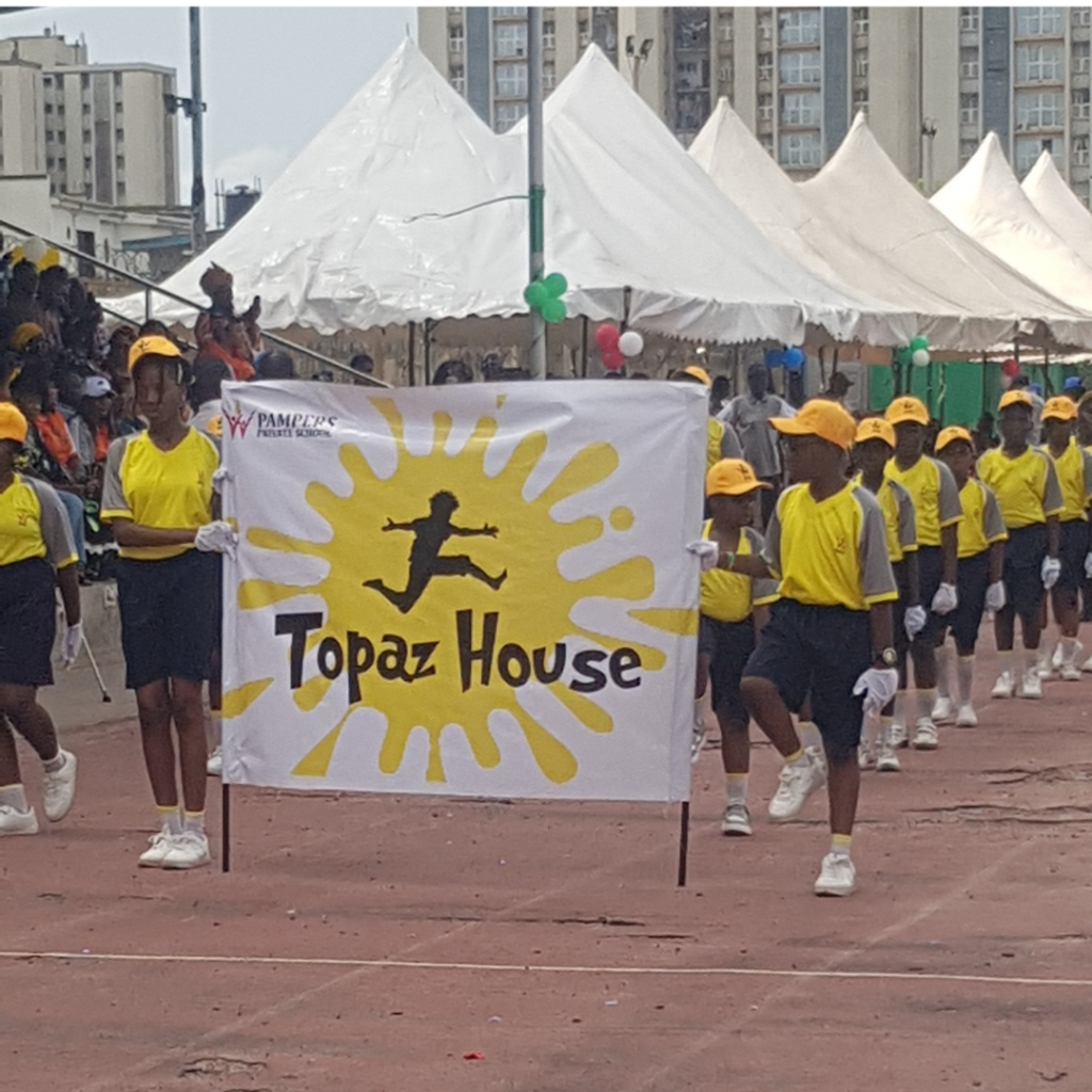 Students and parents at the Pampers Private School 27th Inter-house Sports Competition showcasing vibrant sportsmanship and unity. Topaz House.