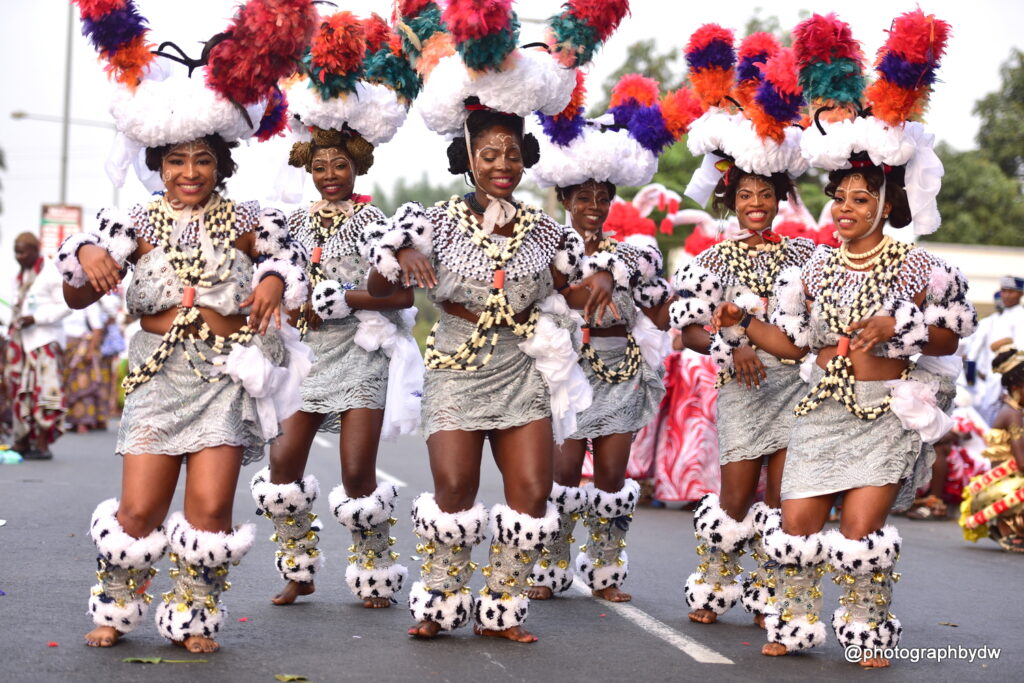  Festive Travel in Nigeria: Calabar Carnival parade showcasing female cultural dance troup. Your Africa Magazine 