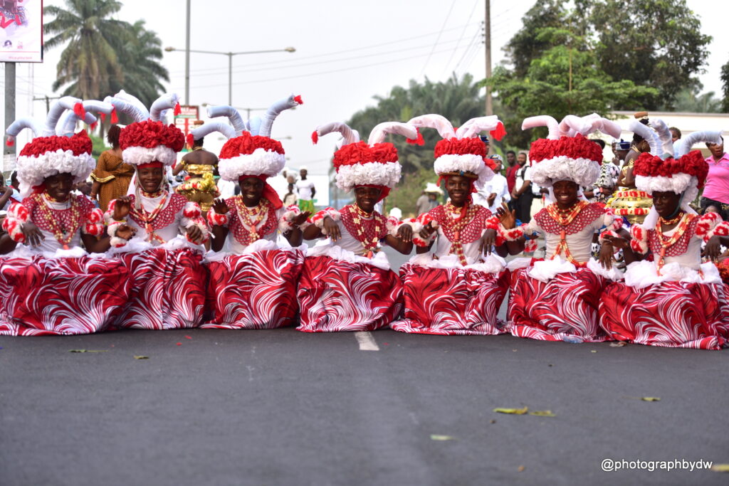 Calabar Carnival parade showcasing male cultural dance troup. Tour Africa Magazine 