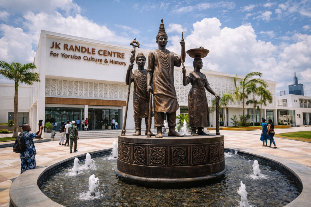Front view of JK Randle Centre for Yoruba Culture and History in Onikan Lagos with traditional Yoruba statues and fountain. Tour Africa Magazine